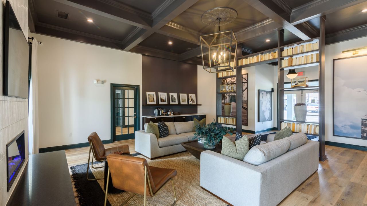 Hawthorne at the Hollow resident clubhouse amenity with seating area and beautiful finishes